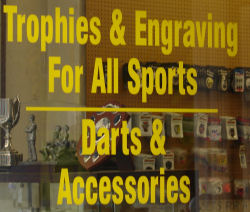 trophies advert outside shop